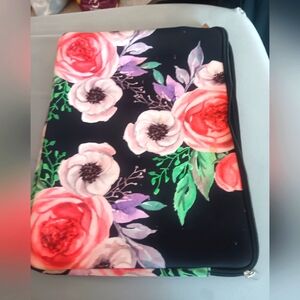 Padded floral laptop sleeve.